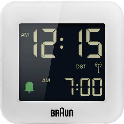 Braun digitaal wekker met display dat 12:15 AM en 7:00 AM alarm toont, met DST-indicator en groen wekker-icoon.