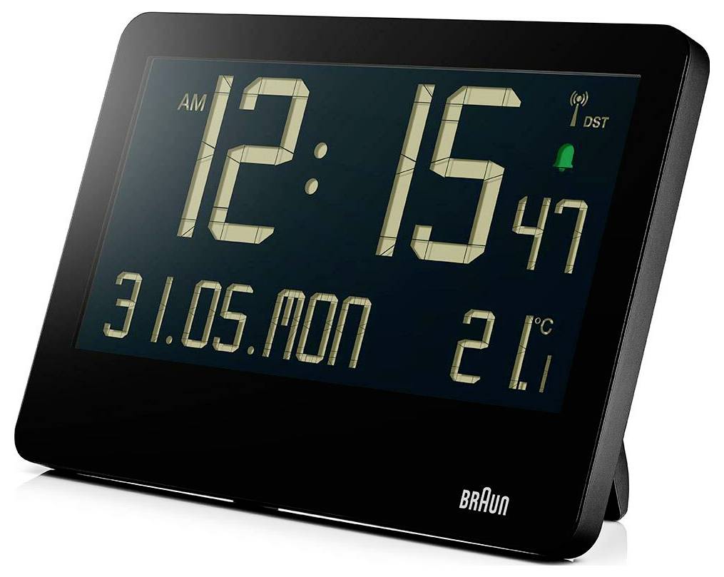 Zwart Braun digitale wekker die 12:15 uur 's nachts weergeeft, datum 31.05.MA, temperatuur 21°C en alarm-/zomertijdindicatoren.