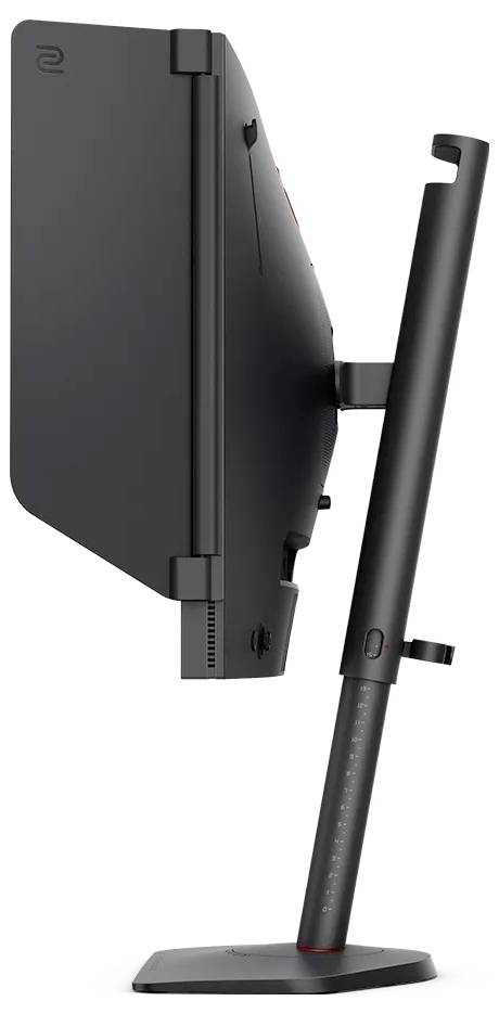 Zijkant van een zwarte gebogen monitor gemonteerd op een verstelbare standaard met een rond voetje op een witte achtergrond.