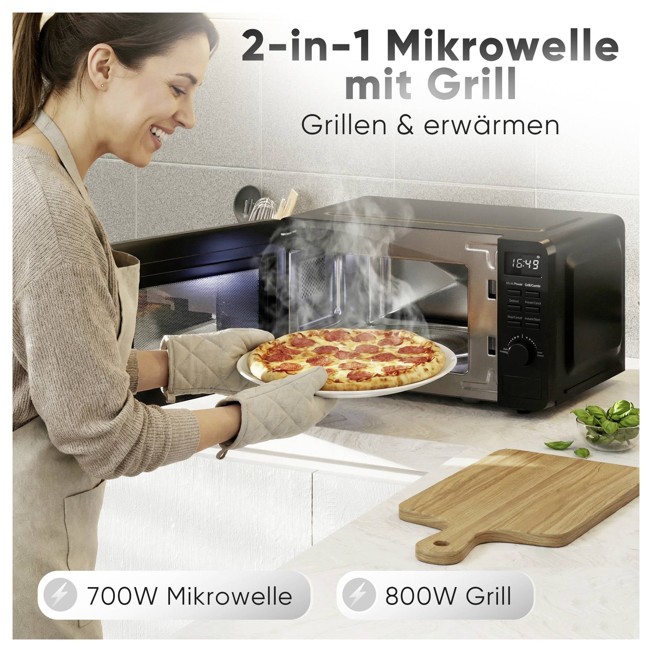 Reclame voor een 2-in-1 magnetron met grill: Vrouw haalt een pizza uit het apparaat; tekst noemt 'Grillen & opwarmen', 700W magnetron en 800W grill.