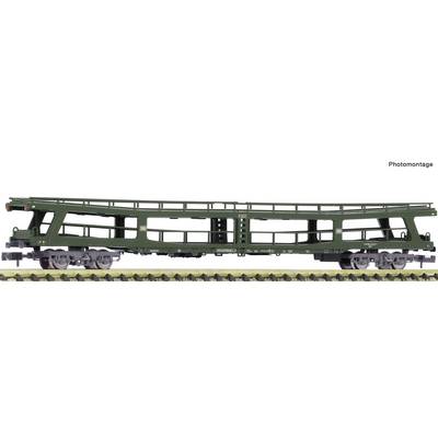 Zijkant van een groene spoorwegonderhoudsloc met een rood-geel sneeuwschuiferbijstuk op rails, gelabeld 'Fotomontage'.