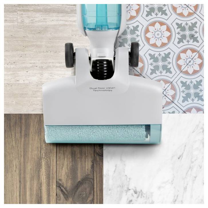 Bovenaanzicht van een vacuümvloerreiniging op gemengde vloermonsters, die dual-floorreinigingstechnologie demonstreert.