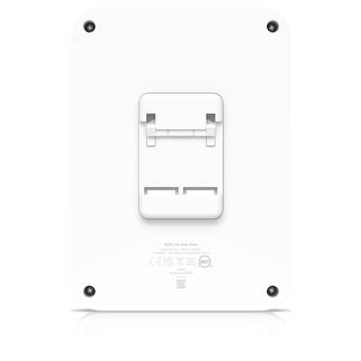 Achterkant van een wit aan de muur gemonteerd elektronisch apparaat met een centrale beugel en vier hoekschroeven.