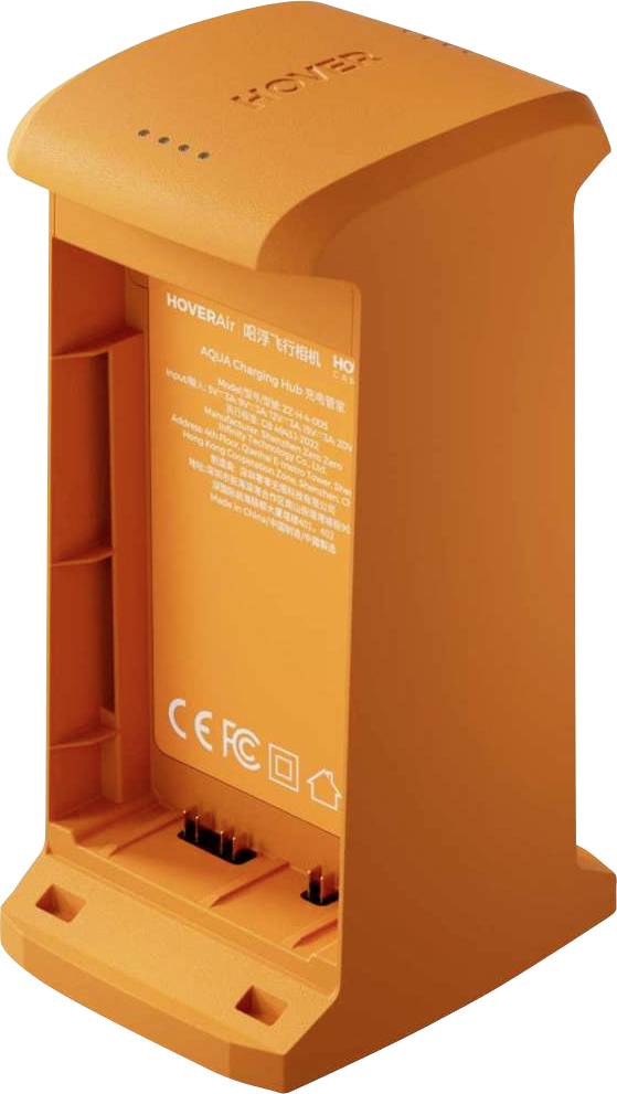 Oranje batterijhouder met schuine bovenkant, voorlabel en bevestigingssleufjes, weergegeven op een witte achtergrond.
