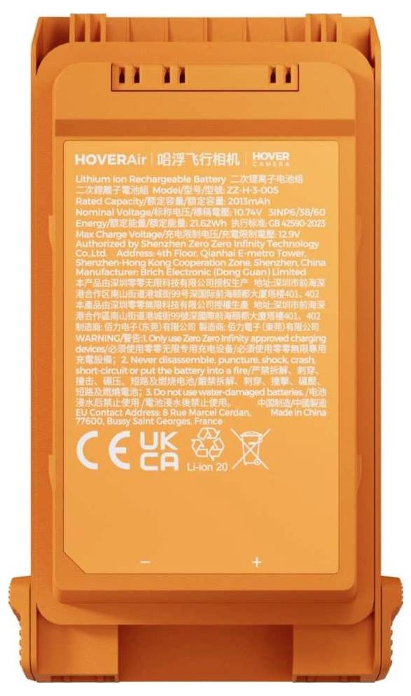 Oplaadbare Li-ion batterijai van Orange voor HOVERAir-cameratorapparaat, met veiligheids- en certificeringstekst erop afgedrukt.