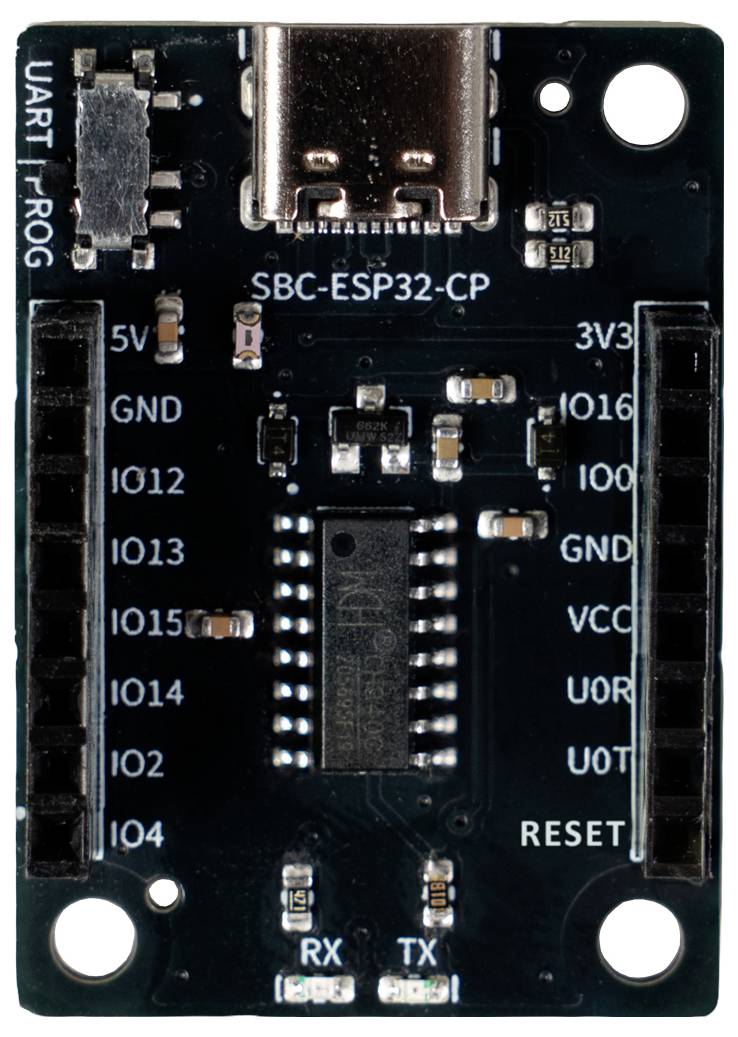ESP32-C3 ontwikkelingsbord gelabeld 'SBC-ESP32-CP' met USB-C poort, aansluitpennen en gemarkeerde voeding-, I/O-, RX/TX- en resetverbindingen.