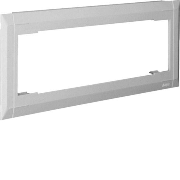 Grijs rechthoekig aan de muur gemonteerd frame of afdekking met een grote lege centrale opening
