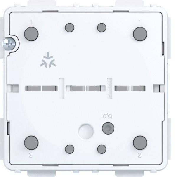 Wit aan de muur gemonteerde elektrische module of schakelaarachterkant met meerdere ronde aansluitingen en gelabelde connectoren '1', '2' en 'cfg'.