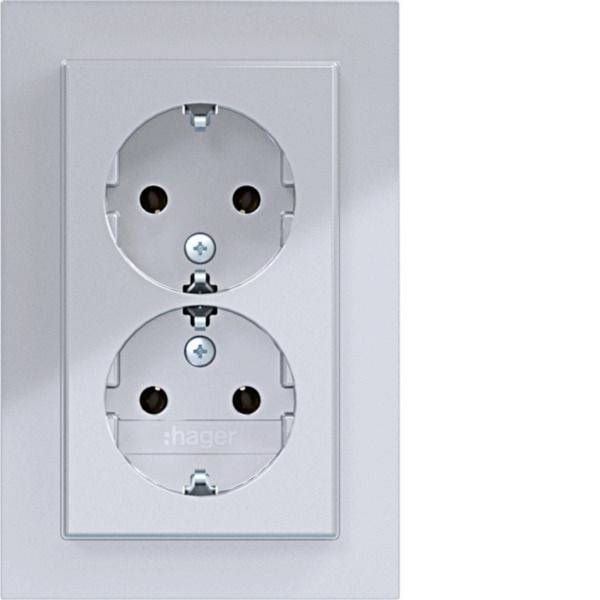 Wit dubbel elektrisch wandcontactdoos op een lichtgrijze plaat, met twee ronde Europese-stijl stekkercontacten verticaal gestapeld.