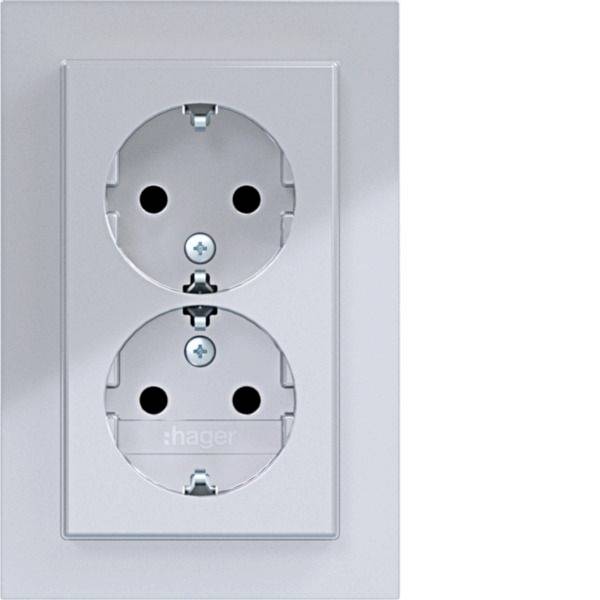Wit dubbel elektrisch wandstopcontact met twee ronde contactdozen op een effen lichtgrijs frontplaatje.