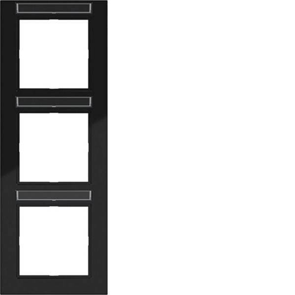 Verticale zwarte filmstrip met drie blanco witte frames gestapeld in een kolom.