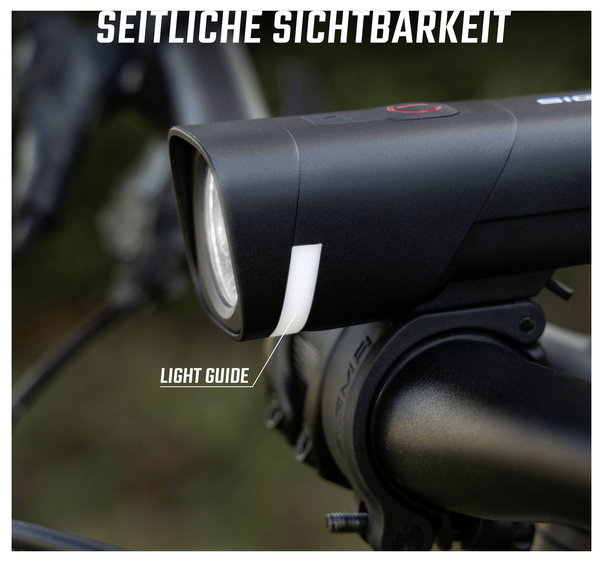 Nahaufnahme van een fietslampen-voorkoplicht met de opschrift 'ZIJDELINGSE ZICHTBAARHEID' en de aanduiding 'LICHTGIDS' aan de zijkant.
