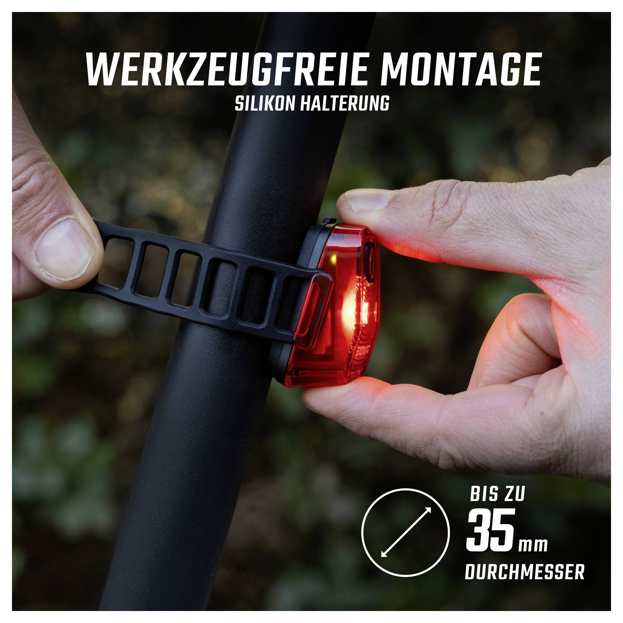 Handen bevestigen een rood fietslicht zonder gereedschap met siliconen houder aan het frame; geschikt voor doorsneden tot 35 mm.