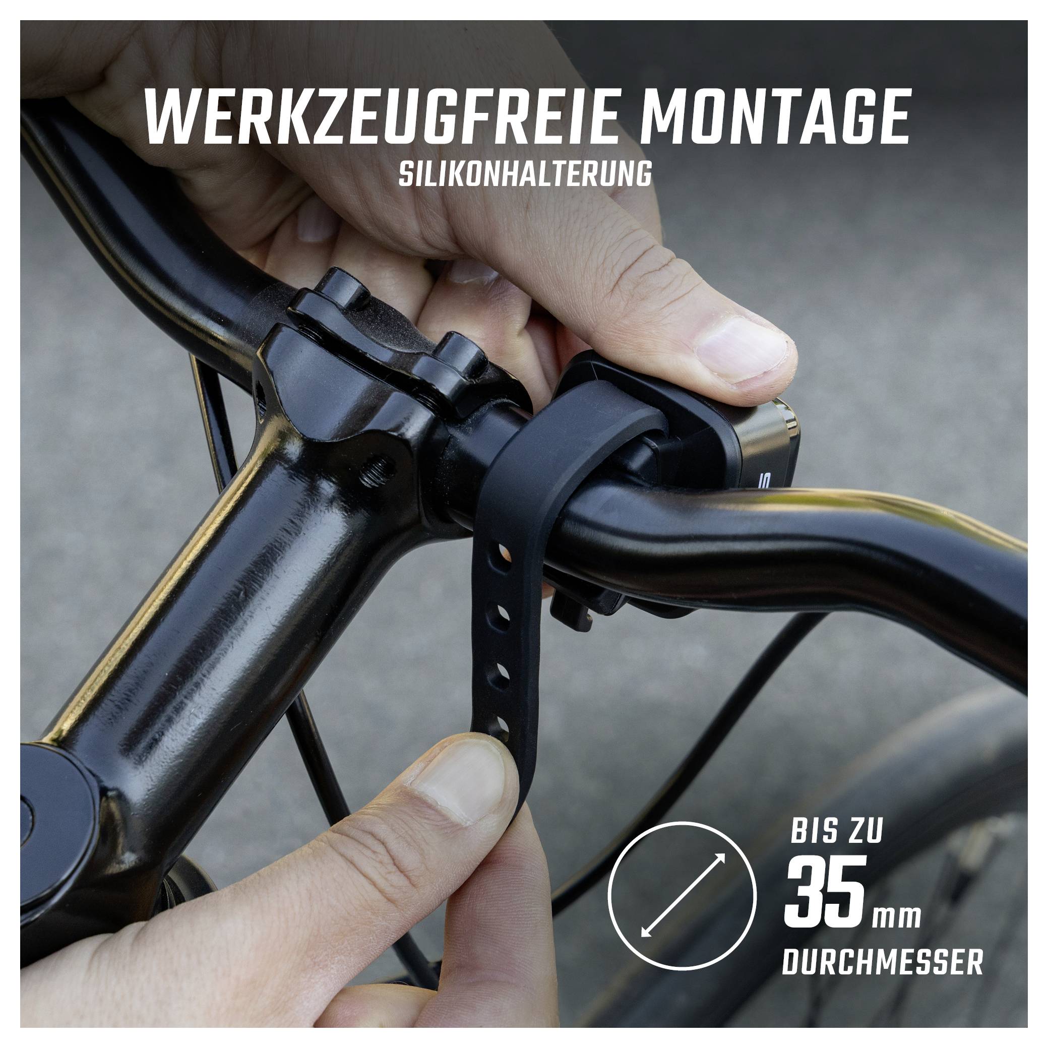 Handen bevestigen een siliconhouder gereedschapsloos aan het fietsframe; Tekst: 'GEREEDSCHAPSLOOS GEMONTEERD', 'TOT 35 mm DIAMETER'.