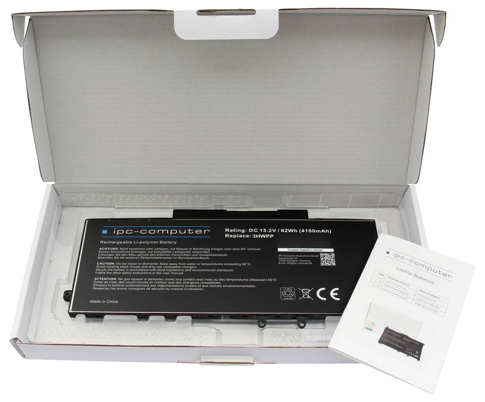 Open doos met een IPC-computer laptopbatterij met een klein instructieblad ernaast.