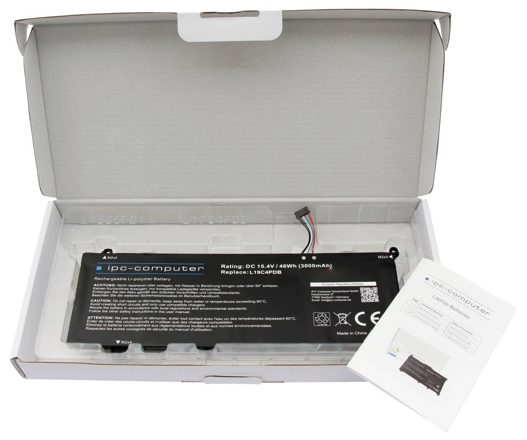 Open doos bevattende een zwarte iPC-computer vervangingslaptopbatterij en een klein instructieblad.