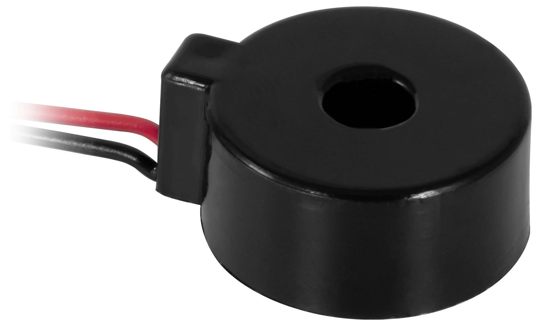 Zwarte ronde stroomtransformator sensor met centraal gat en twee draadleiders, rood en zwart, voor het meten van elektrische stroom.