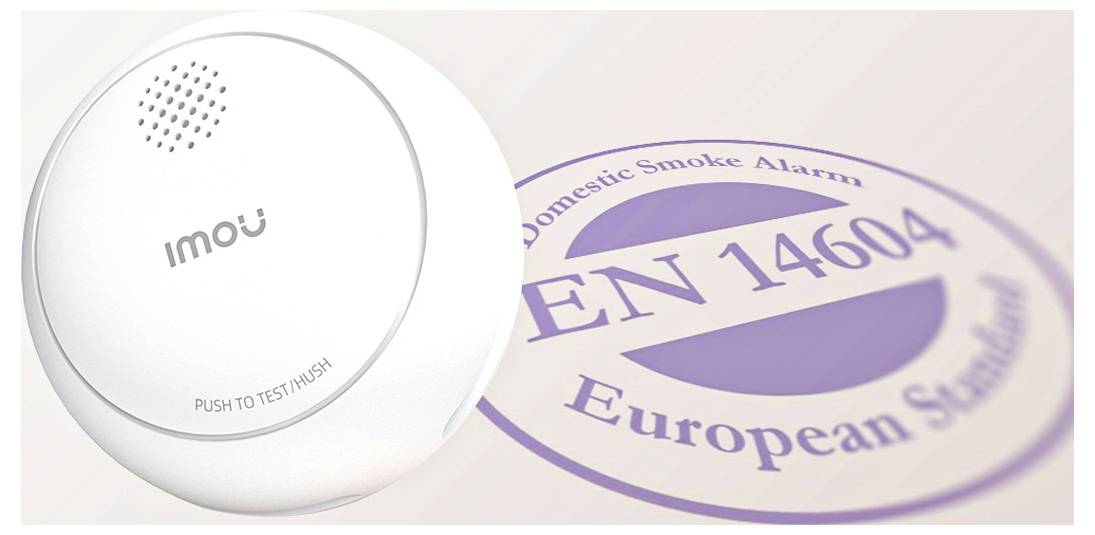 Witte Imou rookmelder met 'PUSH TO TEST/HUSH' knop weergegeven voor een EN 14604 Europese Standaard certificeringszegel.
