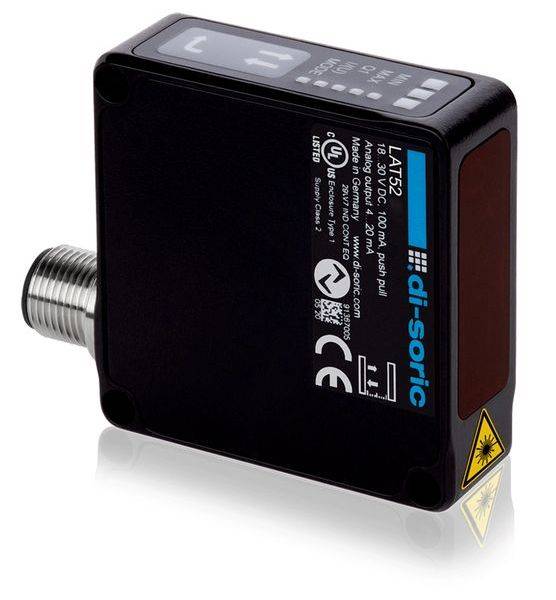 Zwarte di-sorische LAS2 lasersensor met schroefdraad metalen connector en waarschuwingslabel, weergegeven op witte achtergrond.
