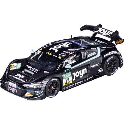 Zwarte raceauto met Joyn, DEKRA 29 en ADAC-stickers, getoond in zijaanzicht op een witte achtergrond.