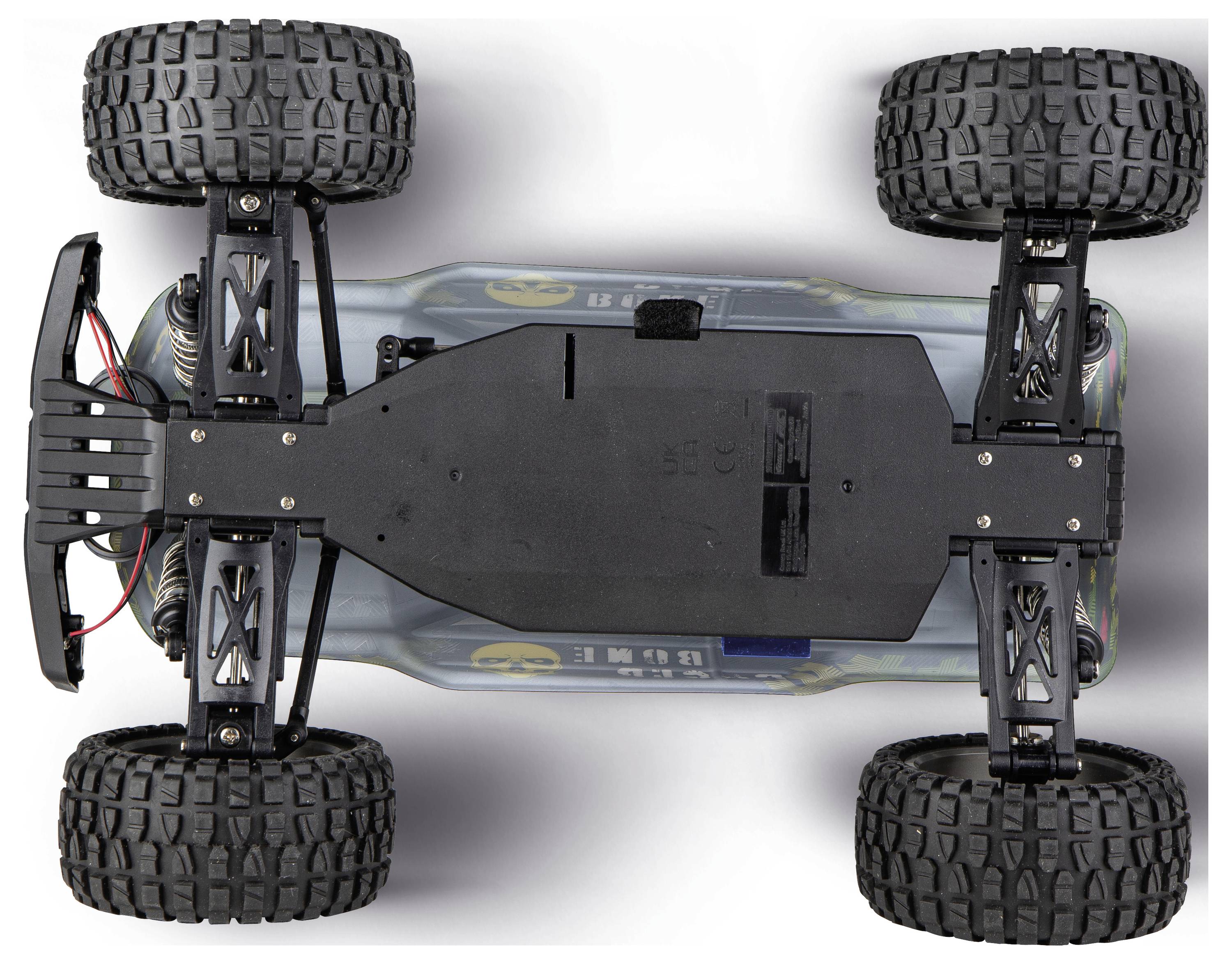 Onderaanzicht van een vierwiel-terreinauto-chassis met afstandsbediening met ophanging, motor en batterijvak.