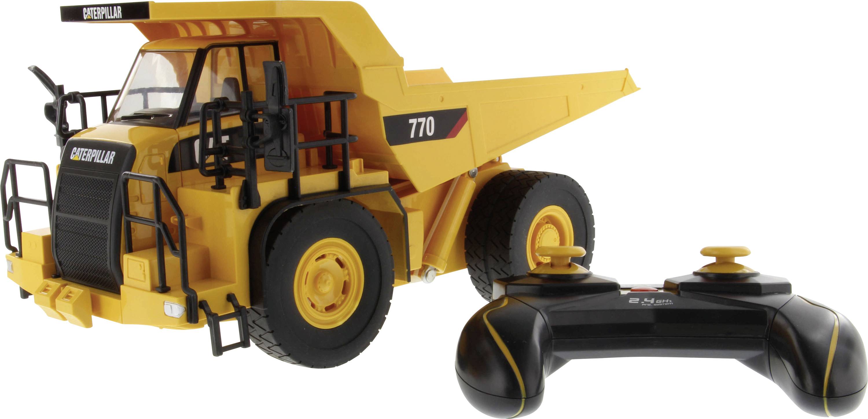 Op afstand bestuurde Caterpillar 770 kiepwagen speelgoed met een zwart-en-gele controller op een witte achtergrond.