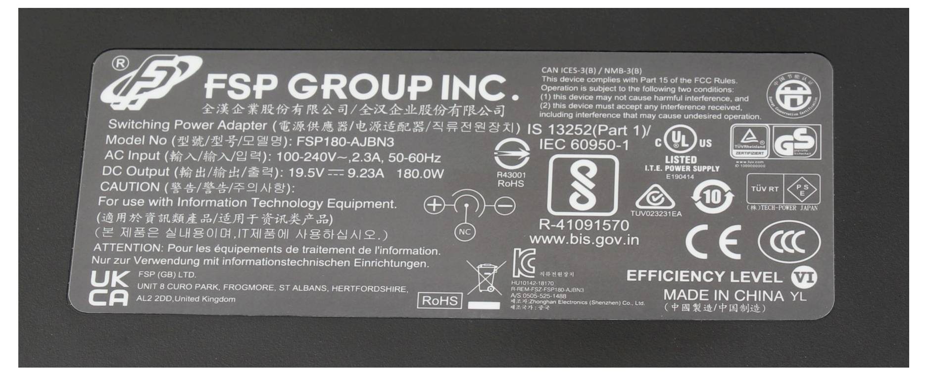 # Productlabel voor FSP Group Inc. schakelende voedingsadapter, met elektrische specificaties, certificatielogo's en efficiëntieklasse 4.
