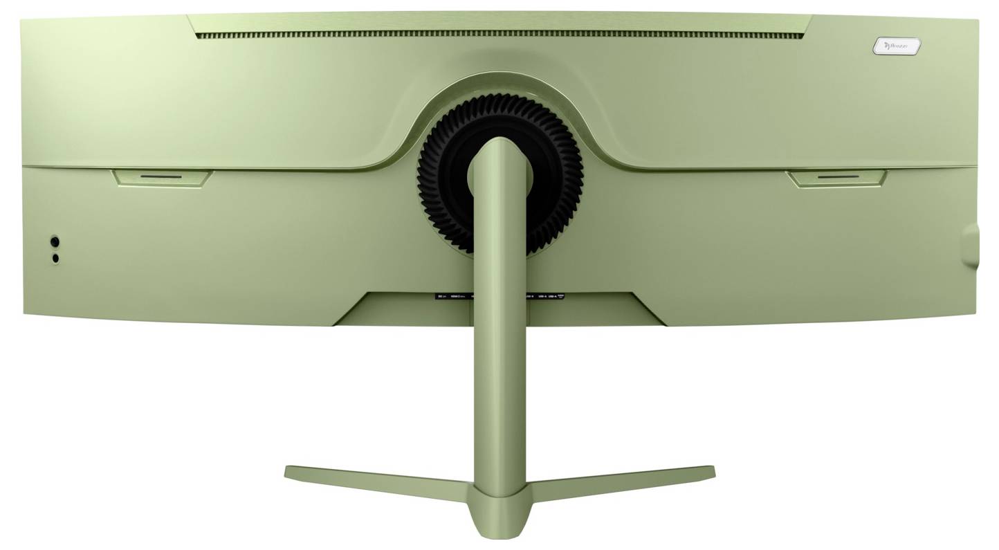 Achterkant van een groene flatscreen monitor op een standaard, met zicht op de centrale kabelopening en brede basis.