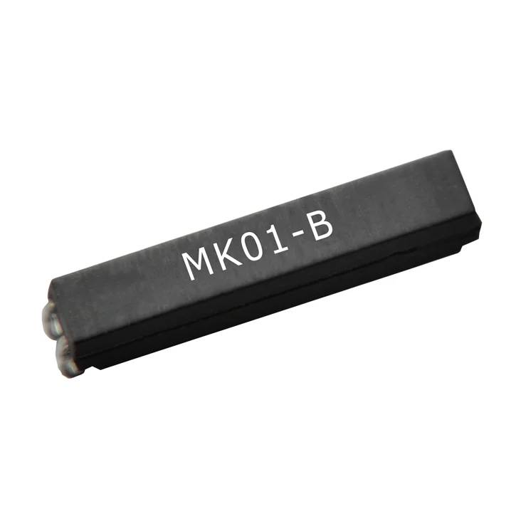 Zwart rechthoekig elektronisch onderdeel met het label 'MK01-B' op een witte achtergrond.
