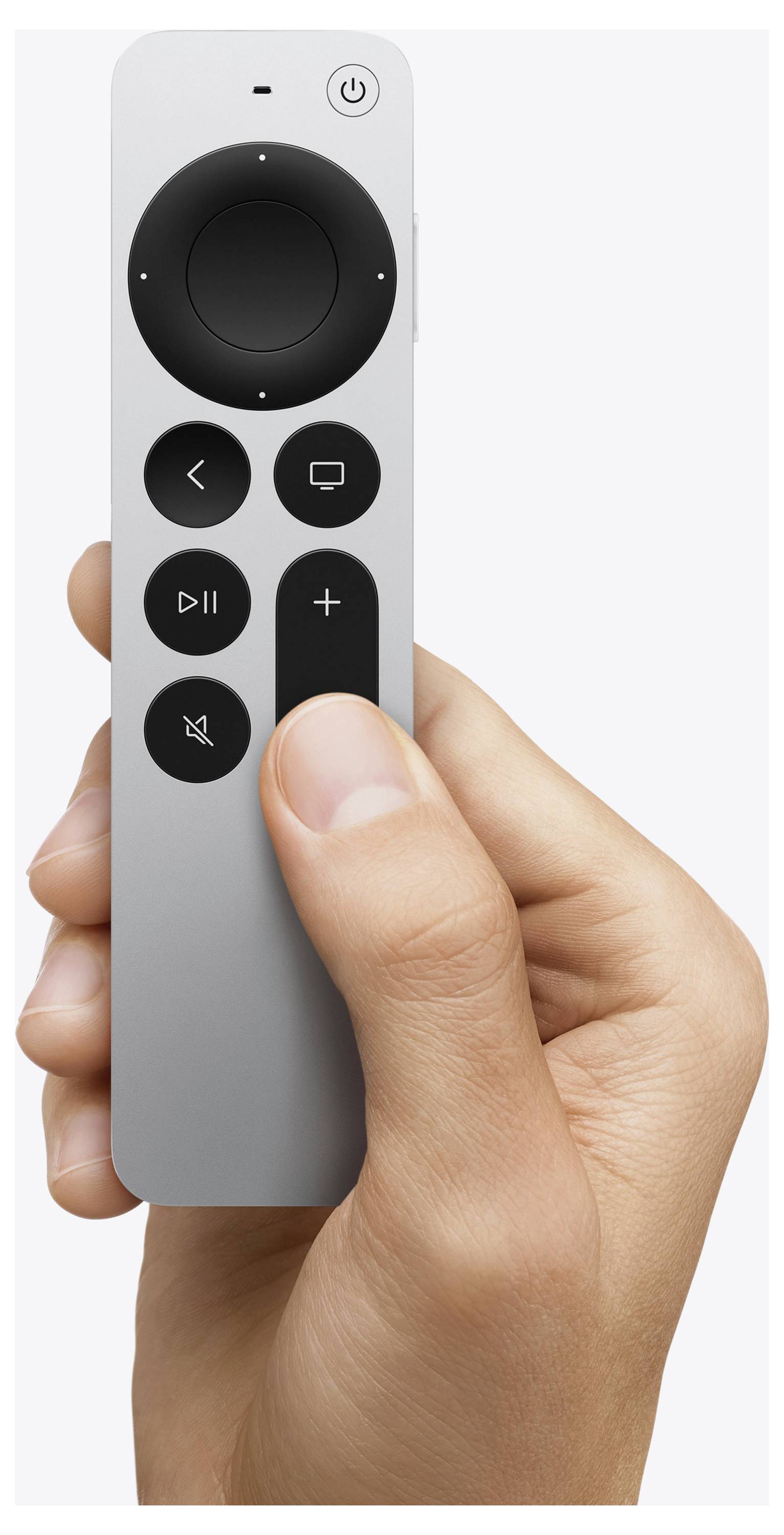 Hand die een grijze afstandsbediening vasthoudt met een circulair navigatiepad, aan/uit-knop, play/pauze-knop, volume- en muteerknoppen.