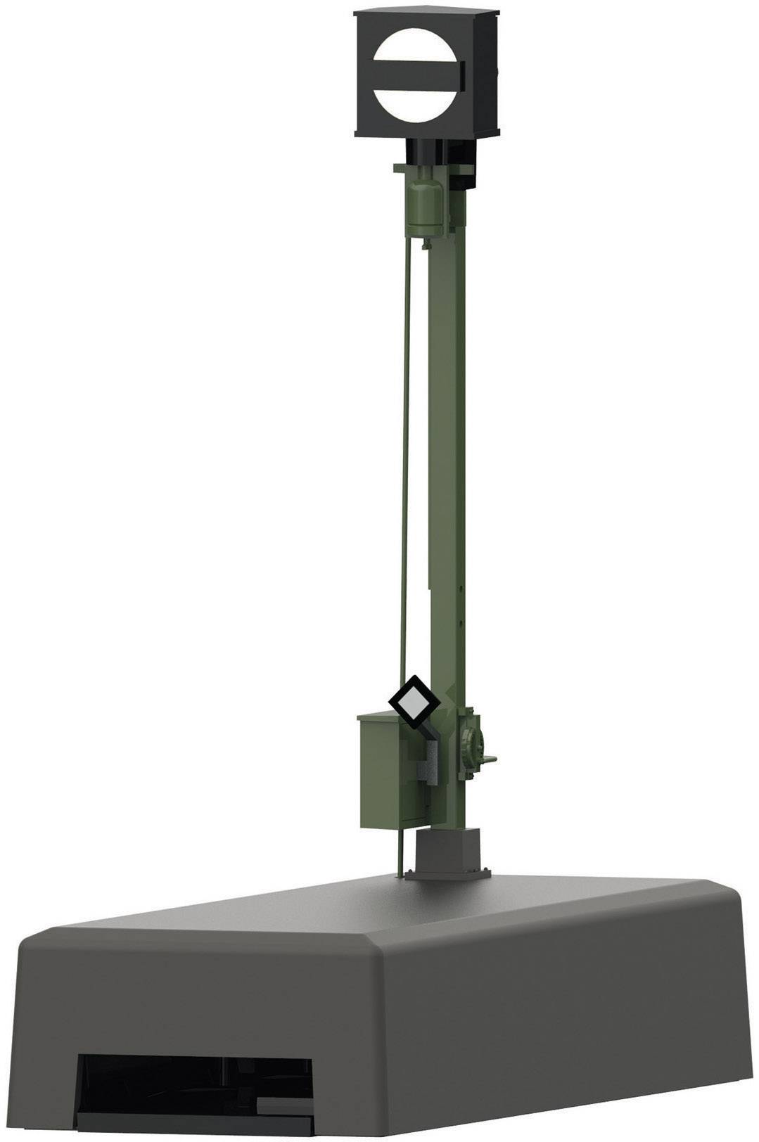 Een groen, verticaal staand signaal op een grijze sokkel, waarschijnlijk voor spoorwegsignalen.