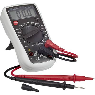 Digitale multimeter met een display met '0.0' toont spanning in volt. Twee meetleidingen, één rood en één zwart, liggen ervoor.