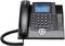 Zwart bureautelefoon met hoorn, numeriek toetsenbord, display toont datum 'Wo 16 juli 2014', en naam 'T. Hartmann'.