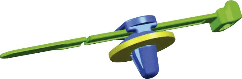 Een blauw en groen plastic speelgoed in de vorm van een propeller met een gele ring, dat vlucht en beweging symboliseert.