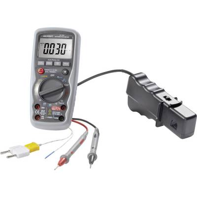 Een digitaal multimeter meet een spanning van 0,730 V. Het is uitgerust met twee meetleidingen en een temperatuursensor.