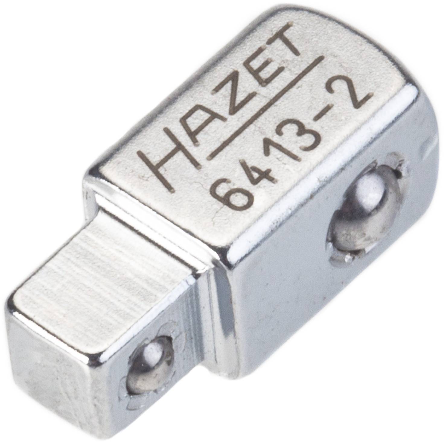 Metaladapter van Hazet, modelnummer 6413-2, met een vierkante aansluiting. Gebruikt voor gereedschapsverbindingen of -aanpassingen.