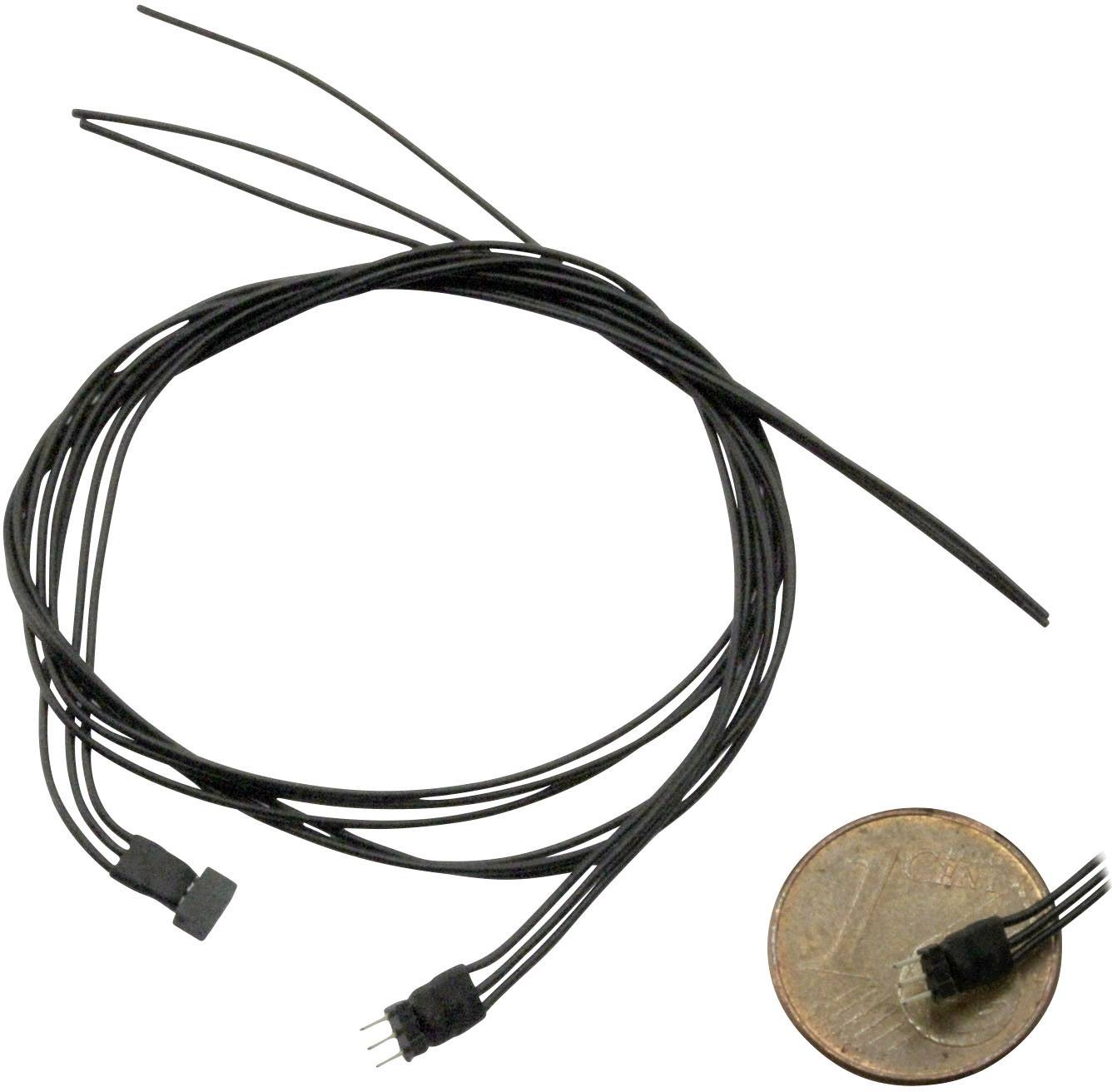 Een dunne zwarte draad met een kleine stekker, naast een munt ter illustratie van de grootte. De draad is opgerold.