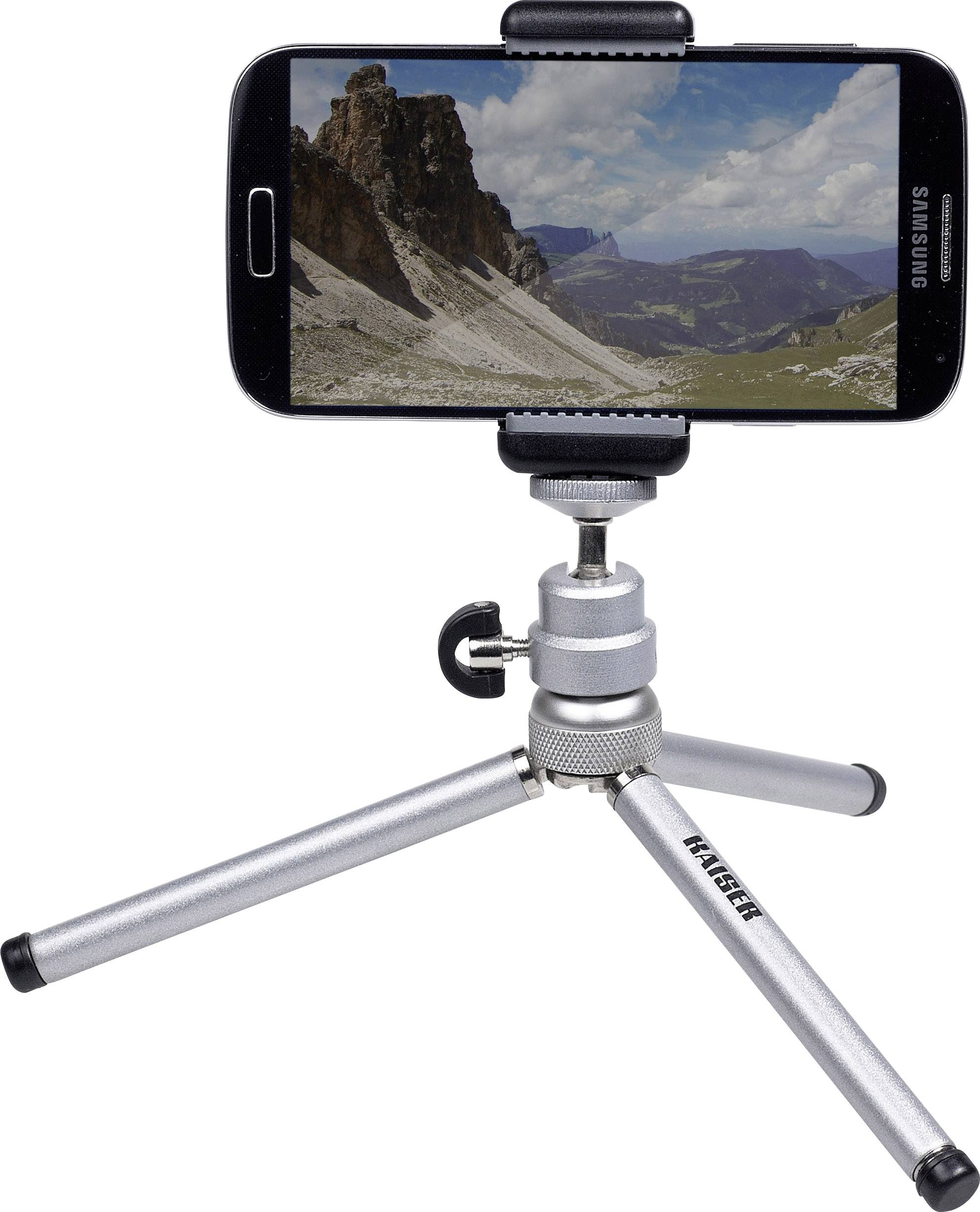 Smartphone op een kleine statief, toont een landschapsfoto met bergen en lucht. Ideaal voor stabiele fotografische opnamen.