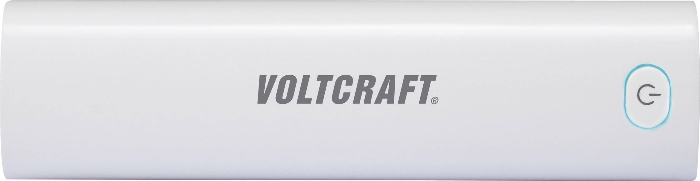 Mobiele oplader van het merk Voltcraft, rechthoekig en wit, met een blauwe aan-knop aan de zijkant.