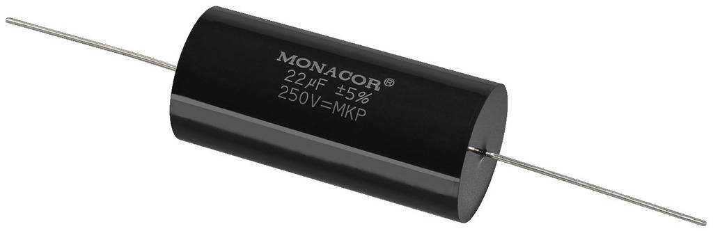Een zwarte cilindercondensator met de aanduiding 'MONACOR 22 µF ±5% 250V=MKP', twee lange aansluitingen aan de uiteinden.