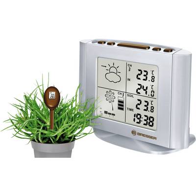 Digitale thermo-hygrometer toont 23,8°C binnen en 24,0°C buiten, tijd 19:38. Bevat grond- en luchtvochtigheidsensor naast potplant.