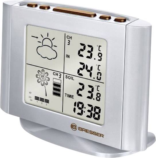 Digitale weerstation toont: 'CH3 op 23,9℃', '24,0% Bodem', Tijd '19:38'. LCD-display met zon- en wolkensymbolen.