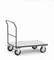 Transportwagen met metalen frame en vier wielen, geschikt voor het vervoeren van zware ladingen in magazijn of werkplaats.