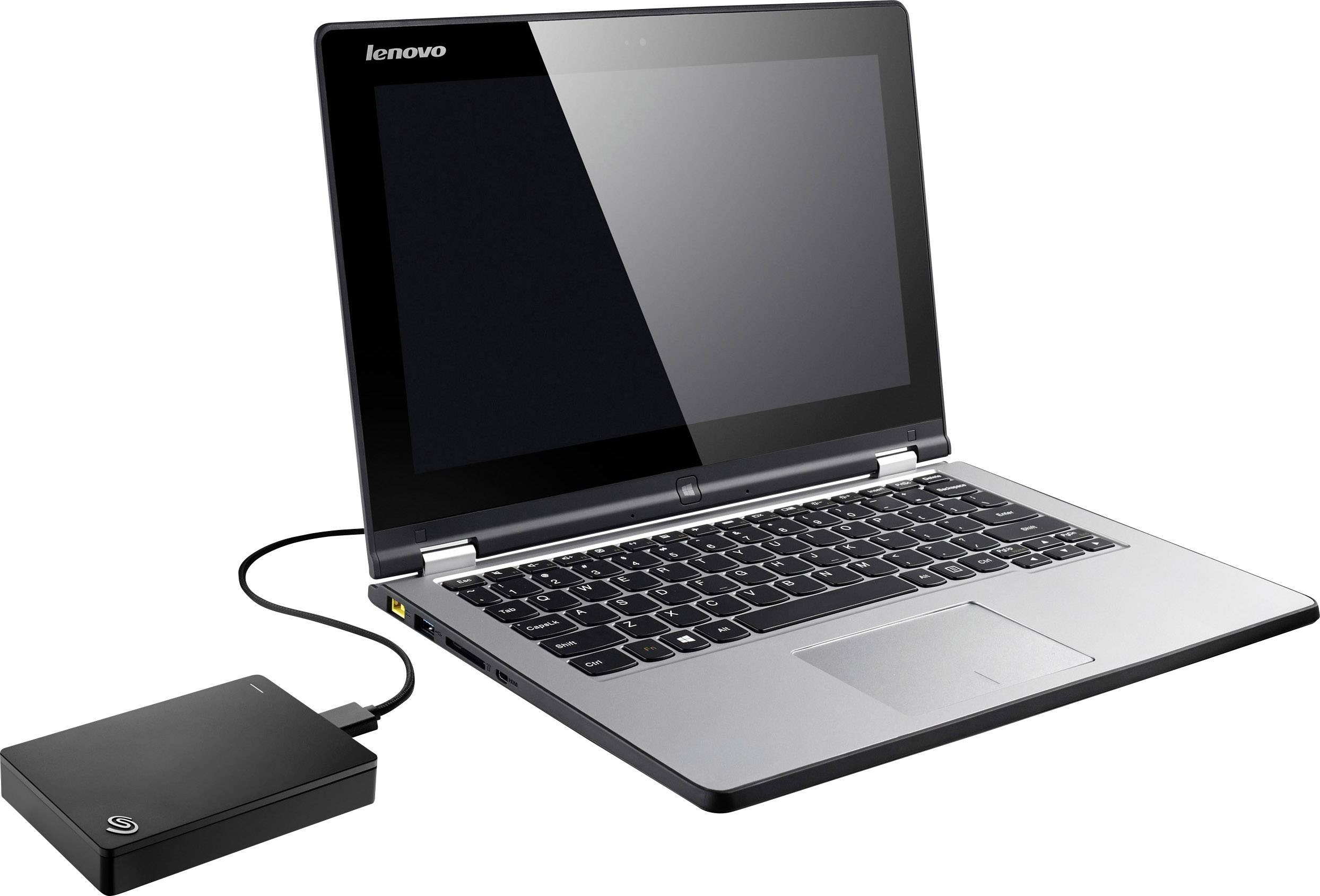 Een laptop met een aangesloten externe harde schijf. De laptop heeft een grijze behuizing en toont het Lenovo-logo aan de rand van het scherm.
