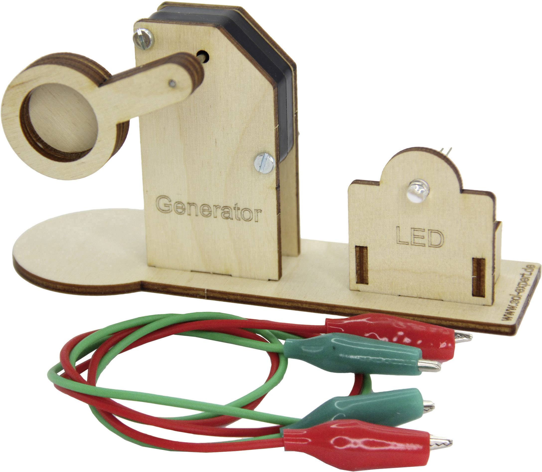Houten model van een handslinger-generator met LED-houder; bevat rode en groene krokodillenklemmen.