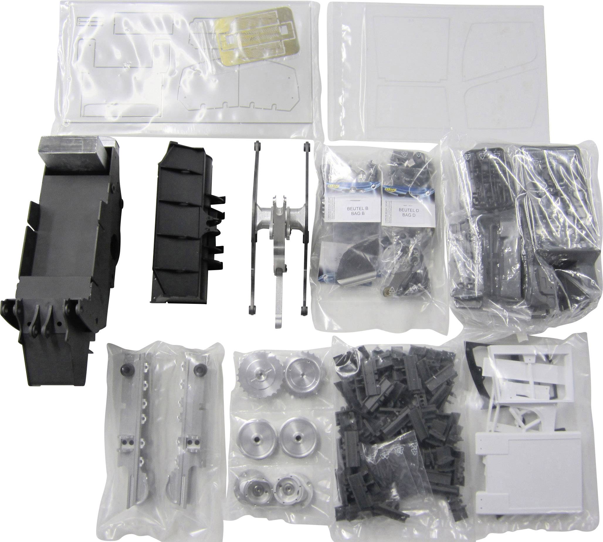 Plastic onderdelen van verschillende vormen en formaten, gesorteerd in zakjes, inclusief modelbouw-instructies. Geschikt voor het assembleren van een model.