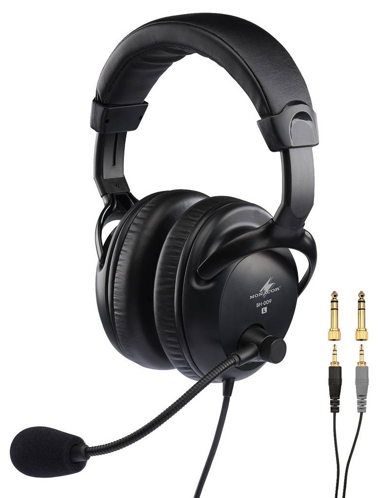 Zwart over-ear headset met microfoon en afneembare kabels, twee verschillende stekkers. Ideaal voor professionele audio-toepassingen.