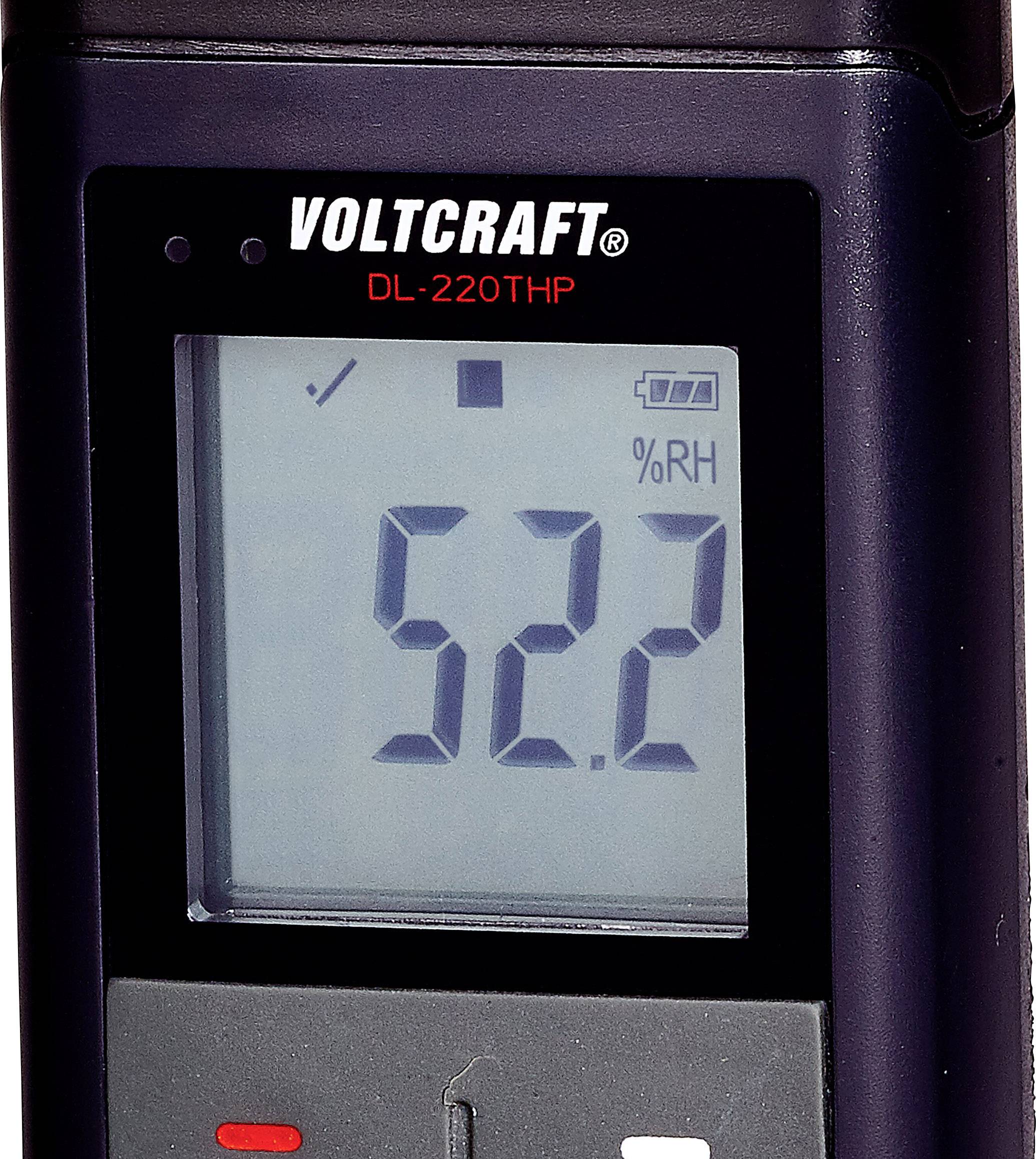 Digitaal thermo-hygrometerdisplay toont '52,2% RV'. Batterijstaatindicator in de rechterbovenhoek. Merk: Voltcraft, Model DL-220THP.