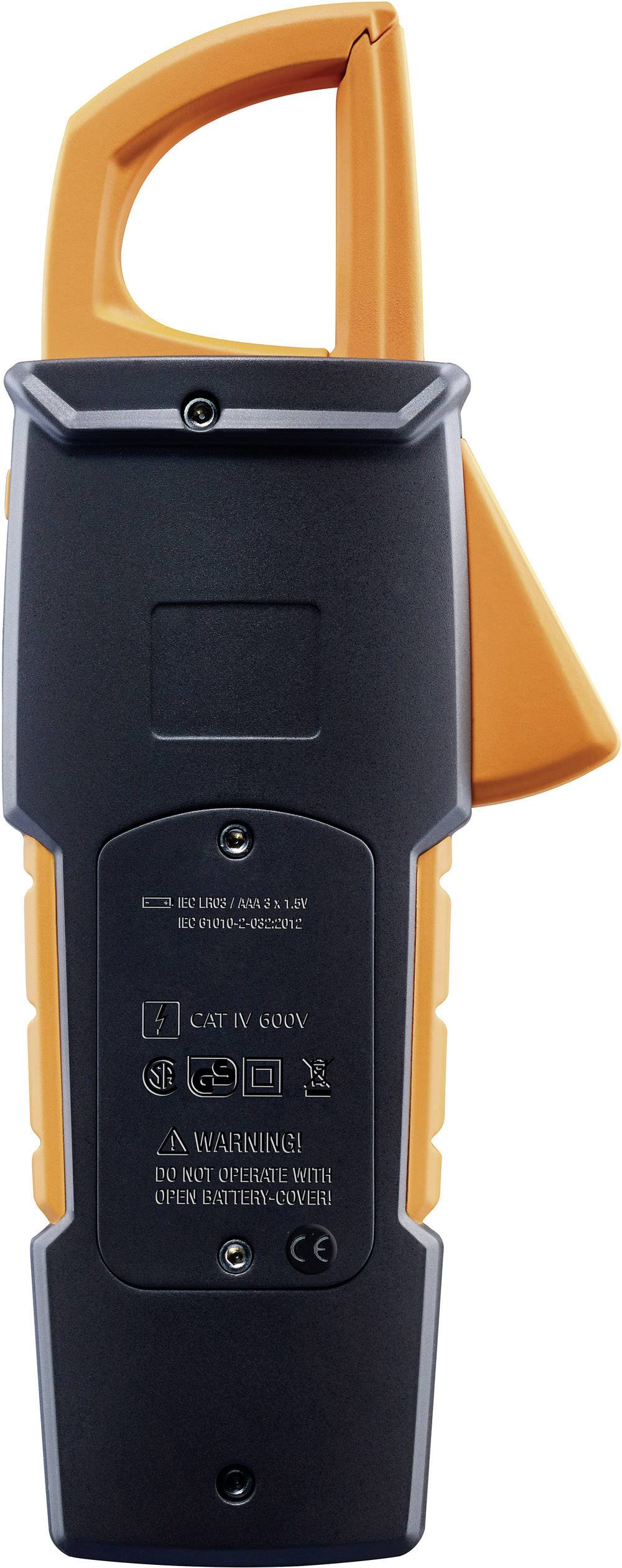 Een zwart en oranje elektrische meetinstrument voor spanningsmetingen, met veiligheidsinstructies op de achterkant.