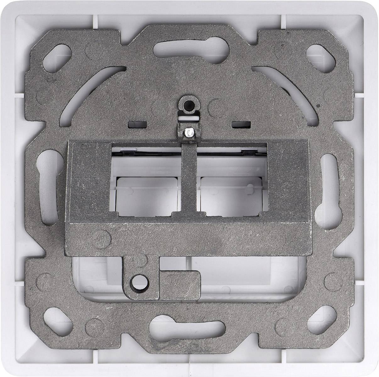 Metalen frame van een elektrische schakelaar zonder afdekking, toont bevestigingspunten en vijf gaten voor de bedrading.